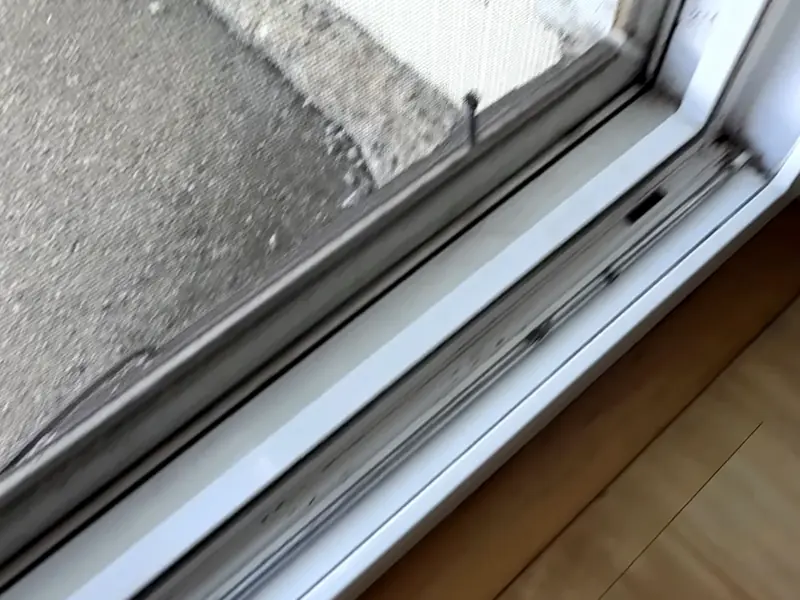 The same window track after a deep clean, cleared of dirt and debris